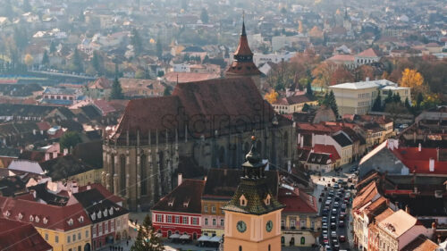 Video Aerial drone view of the Christmas tree being installed in The Council Square in the historic center of Brasov, Romania - Starpik