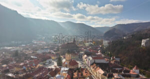 Video Aerial drone view of the Christmas tree being installed in The Council Square in the historic center of Brasov, Romania - Starpik