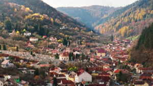 Video Aerial drone view of the St. Nicholas Church near a cemetery in Brasov, Romania - Starpik