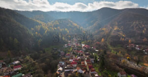 Video Aerial drone view of the city center of Brasov in south-eastern Transylvania, Romania surrounded by mountains - Starpik