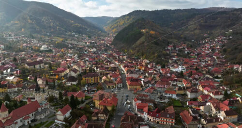 Video Aerial drone view of the city center of Brasov in south-eastern Transylvania, Romania surrounded by mountains - Starpik