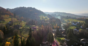 Video Aerial drone view of the commune in Brasov County, Transylvania, Romania - Starpik