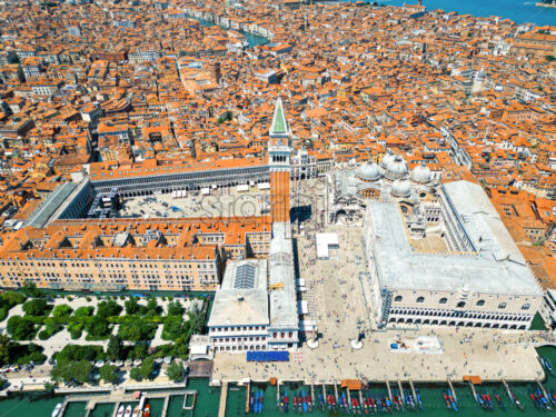 Aerial drone view of Venice, Italy. Historical city centre with St Mark’s Square and other old buildings and narrow streets - Starpik