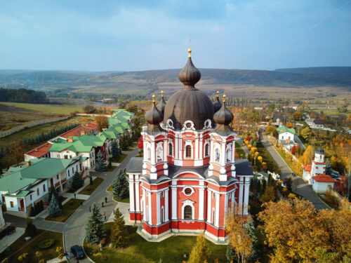 Aerial shot of Curchi Monastery at daylight. Autumn warm colors. Moldova landmarks - Starpik