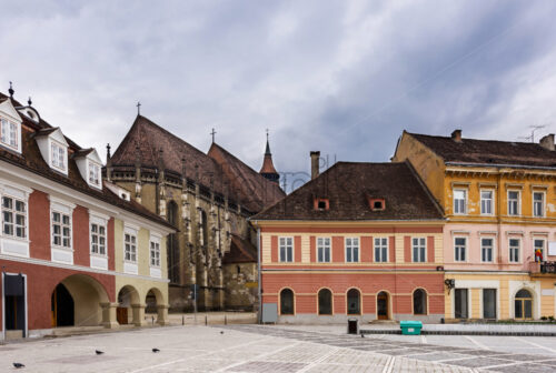 BRASOV, ROMANIA – MARCH 09, 2016: Photo of downtown and main square landmark with the famous black church view - Starpik