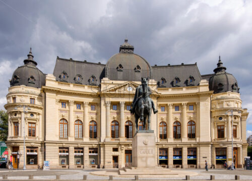 BUCHAREST, ROMANIA – 25 SEPTEMBER, 2018: facade of central university library and the monument of Carol I - Starpik