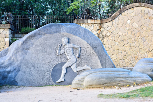 Barcelona, Catalunya, Spain: the hill of Montjuich and the Museum of Catalan Art: a sport statue of the park - Starpik