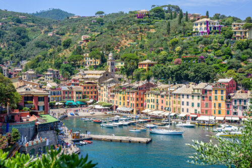 Beautiful daylight view to ships on water and buildings in Portofino city - Starpik