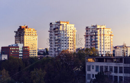 Beautiful sunset in Chisinau town. Warm light reflecting on buildings. Purple blue sky on background. Negative copy space, place for text. Moldova beauties - Starpik