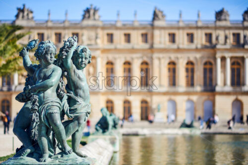 Bronze sculpture in the garden of Versailles Palace. Paris, France - Starpik