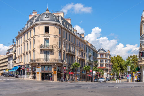 CANNES, FRANCE – AUGUST 12, 2018: City at daylight with a few traffic. Blue sky on background - Starpik