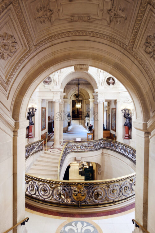 CHANTILLY, FRANCE – 4 OCTOBER 2018: Interior of Chantilly castle museum. Hall with stairs is decorated with paintings, sculptures and columns - Starpik