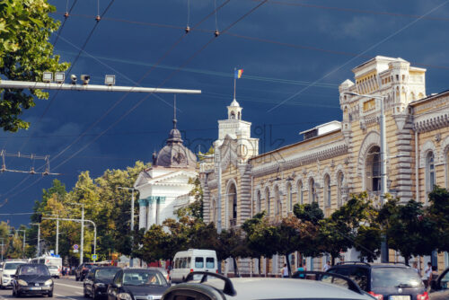 CHISINAU, MOLDOVA – JULY 24, 2018: architecture of the town hall and city municipality building before rain with dark sky - Starpik