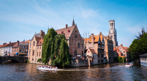 Canal boat tour around Belfry, Bruges, Belgium - Starpik