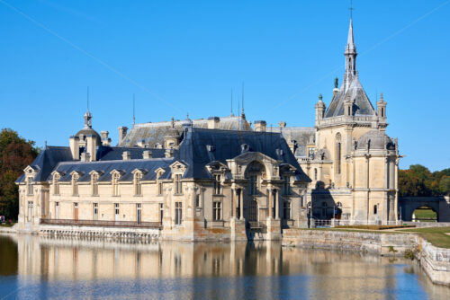 Chantilly Castle and Museum of Conde at daylight in France - Starpik