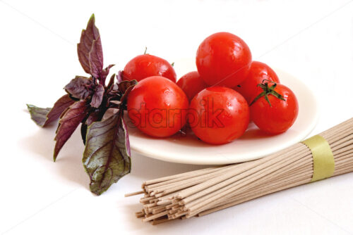 Cherry tomatoes, basil and pasta best ingredients for italian dinner - Starpik