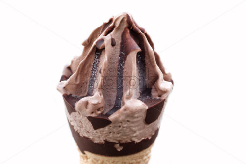 Chocolate ice cream cone isolated on white, close up - Starpik