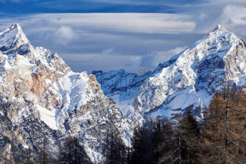 Close up shot of Cortina d’Ampezzo mountains covered in snow at daylight. Italy - Starpik