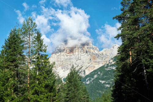 Close up shot of Cortina d’Ampezzo mountains covered in snow at daylight. Italy - Starpik