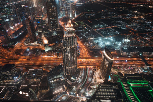 Colourful view of Dubai, United Arab Emirates. Aerial view on highways and skyscrapers. Wide angle shot of the cityscape - Starpik