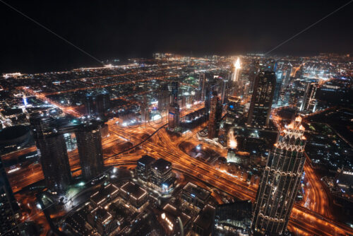 Colourful view of Dubai, United Arab Emirates. Aerial view on highways and skyscrapers. Wide angle shot of the cityscape - Starpik