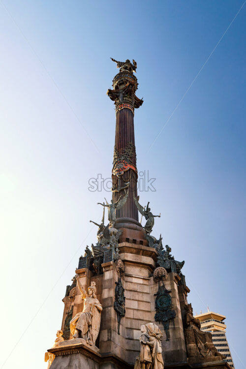 Columbus Monument at sunset. Clear sky on background, Barcelona, Spain - Starpik