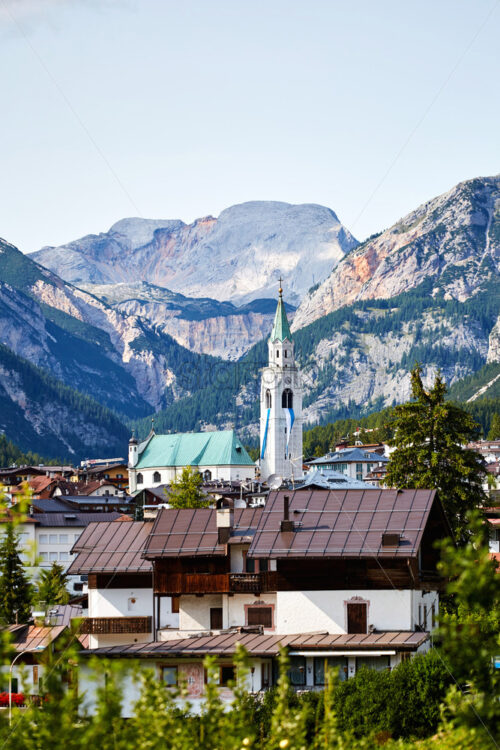 Cortina d’Ampezzo city with mountains on background. Belluno, Italy - Starpik