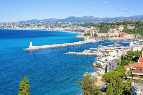 Daylight view to beachline and blue sea of Antibes, France - Starpik