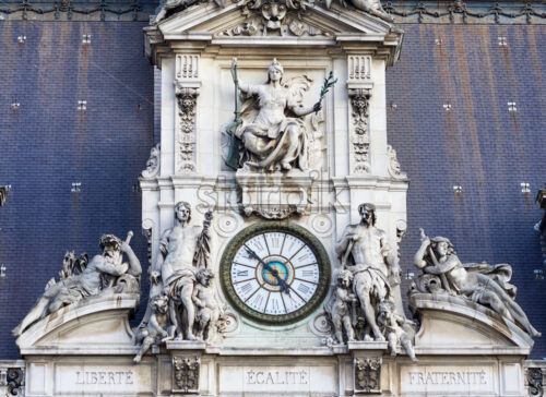 Details of the clock of the Hotel de Ville or Council building. Paris, France - Starpik