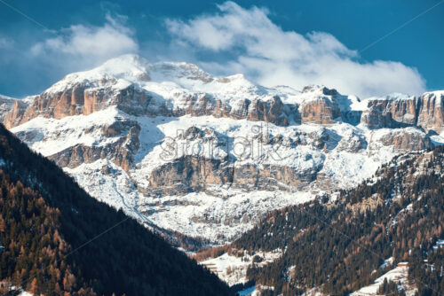 Dolomites mountains covered in snow in winter season. Province of Belluno, Italy - Starpik