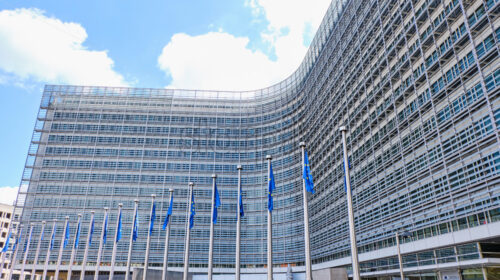 Flags of Europe in front of Berlaymont European Commision building in Brussels, Belgium - Starpik