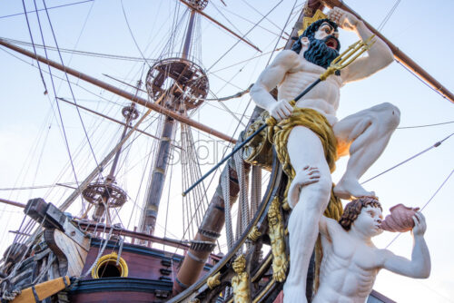 GENOA, ITALY – AUGUST 05, 2018: Galleon Neptune front side in the old harbour at sunset - Starpik