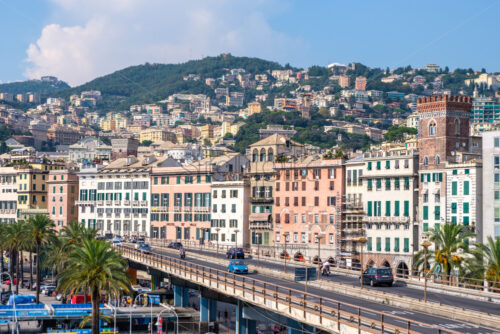 GENOA, ITALY – AUGUST 05, 2018: Promenade near Porto Antico with highway nearby. Wide shot. - Starpik