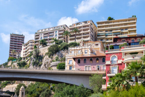 Hotel buildings near bridge. Blue sky on background. Monte Carlo, Monaco - Starpik