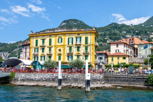 LOMBARDY, ITALY – AUGUST 03, 2018: Hotel Olivedo in a sunny day. View from shore. Varenna town - Starpik