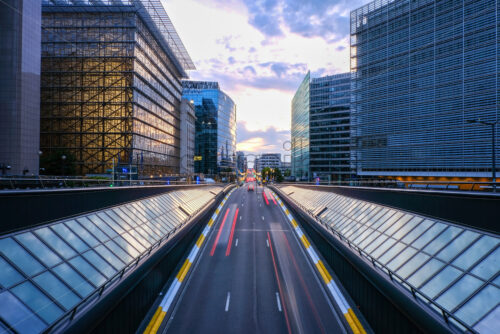 Long exposure shot from a bridge in Brussels. Traffic tunel and Europen headquarters in the foreground - Starpik