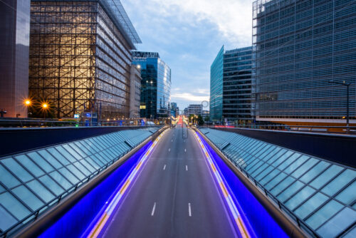 Long exposure shot from a bridge in Brussels. Traffic tunel and Europen headquarters in the foreground - Starpik