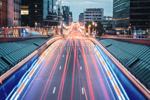 Long exposure shot from the bridge in Brussels, Belgium. Red traffic lights on the road - Starpik