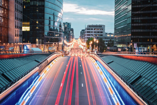 Long exposure shot from the bridge in Brussels, Belgium. Red traffic lights on the road - Starpik