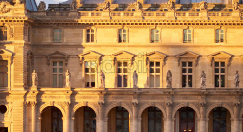 Louvre Museum facade at sunset. Paris, France - Starpik