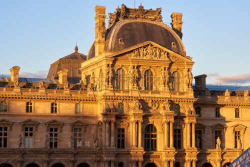 Louvre Museum facade at sunset. Paris, France - Starpik