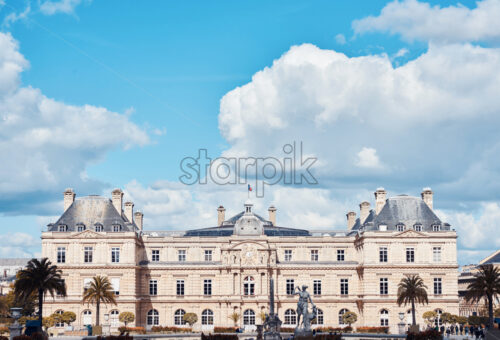 Luxembourg Palace with clouds above. Paris, France - Starpik