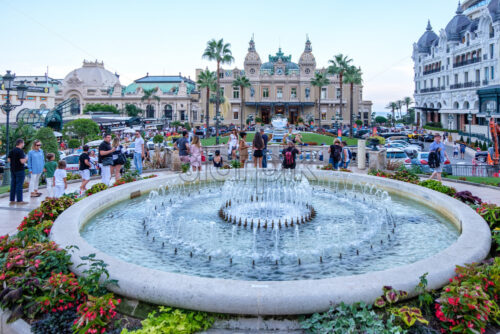 MONACO, FRANCE – AUGUST 08, 2018: Monte Carlo Place du Casino at sunset with rich chars and tourists exploring local beauties - Starpik