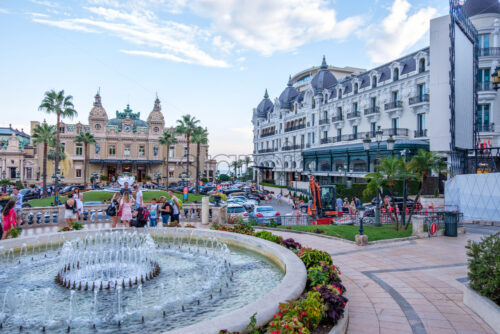 MONACO, FRANCE – AUGUST 08, 2018: Monte Carlo Place du Casino at sunset with rich chars and tourists exploring local beauties - Starpik