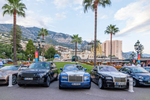 MONACO, FRANCE – AUGUST 08, 2018: Monte Carlo Place du Casino at sunset with rich chars and tourists exploring local beauties - Starpik