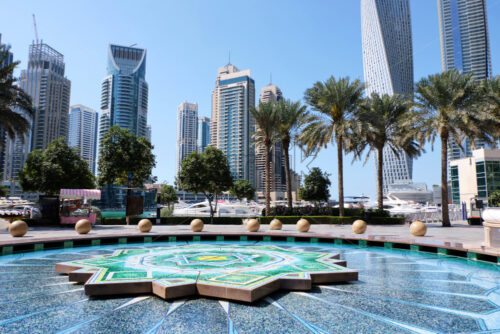 Marina pond in Dubai. Tower and cityscape on background, United Arab Emirates - Starpik