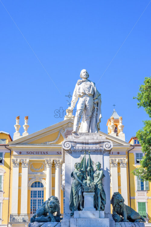 NICE COTE D’AZUR, FRANCE – JUNE 28, 2017: Daylight view to Giuseppe Garibaldi statue in front of a , negative copy space - Starpik