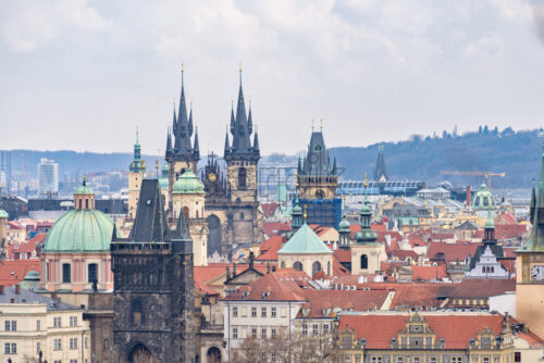 Old city buildings and famous castle from above in a cloudy day. Miniature style photography. Negative copy space, place for text. Prague, Czech Republic - Starpik