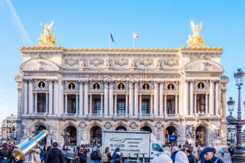 PARIS, FRANCE – OCTOBER 01, 2018: Front view to National Academy of Music in Paris. Bright day with harsh light. Busy roads, plenty of poeple. Orange and teal look - Starpik