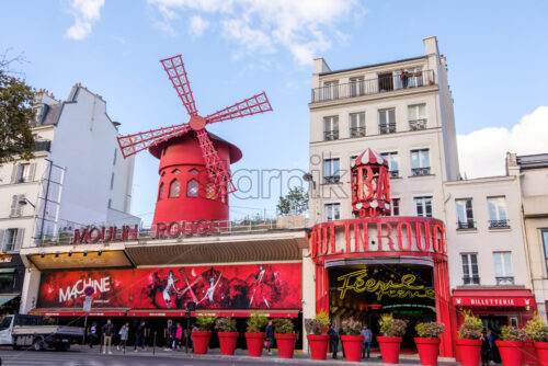 PARIS, FRANCE – OCTOBER 01, 2018: Wide view to the famous Moulin Rouge cabaret in Paris. A well known entertainment place in France - Starpik